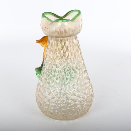 1109 - A Loetz moulded iridescent glass vase with applied flowers, height 18cm