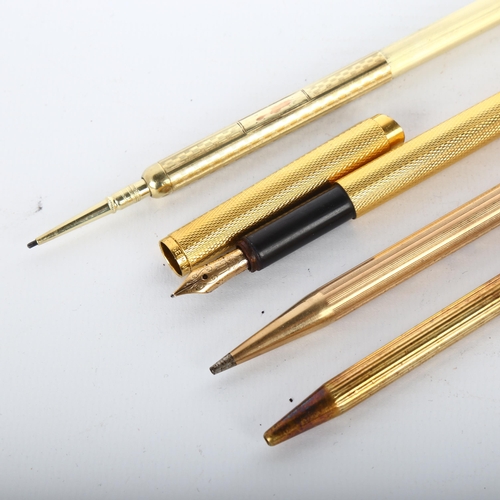 1113 - Dupont silver-gilt ballpoint pen, Dunhill gold plated fountain pen, gold plated fob extending pencil... 