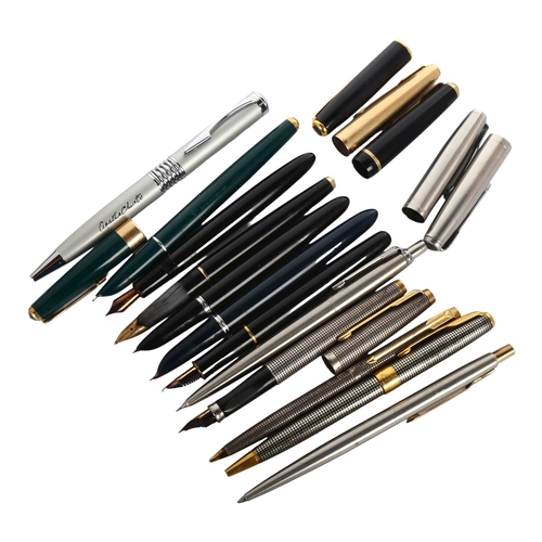 1114 - A group of fountain pens and ballpoint pens