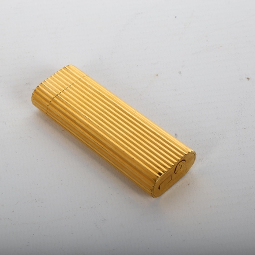 1116 - CARTIER - gold plated pocket lighter, length 7cm