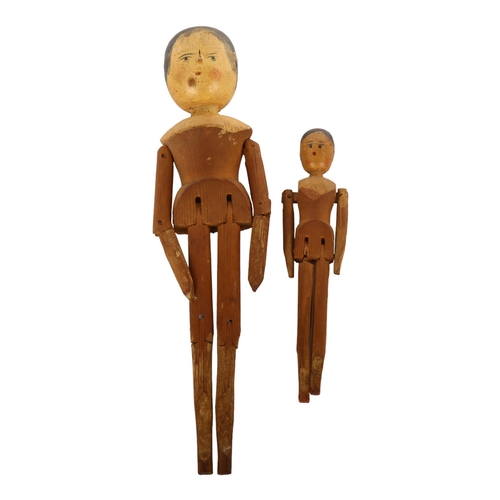 1117 - 2 Victorian painted and jointed wood peg dolls, largest height 28cm (2)