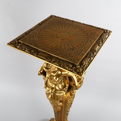 1059 - Empire style gilt-bronze jardiniere stand, the relief moulded square top supported by Classical figu... 