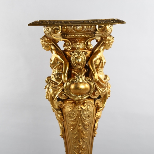 1059 - Empire style gilt-bronze jardiniere stand, the relief moulded square top supported by Classical figu... 