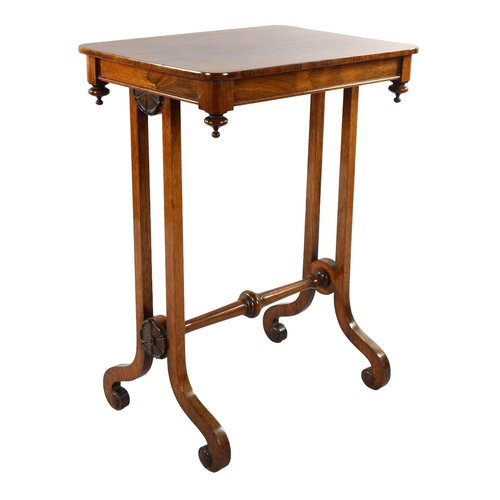 1067 - **DESCRIPTION CHANGE** A small William IV rosewood stretcher table *with John Wilkie label on the un... 