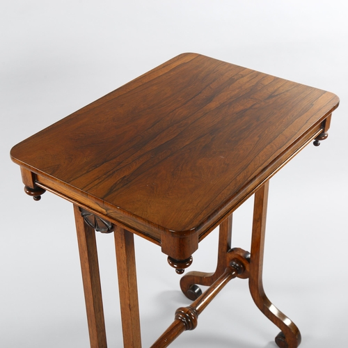 1067 - **DESCRIPTION CHANGE** A small William IV rosewood stretcher table *with John Wilkie label on the un... 