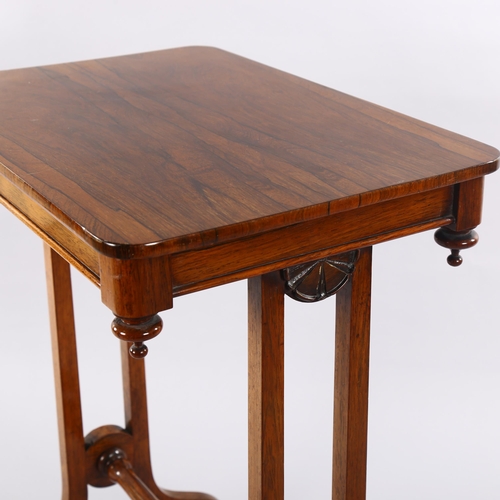 1067 - **DESCRIPTION CHANGE** A small William IV rosewood stretcher table *with John Wilkie label on the un... 