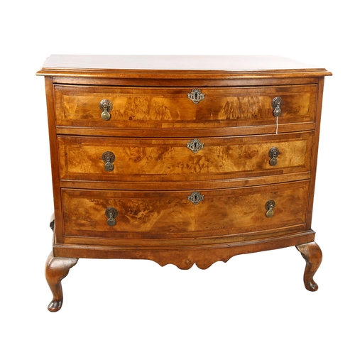 1071 - A burr-walnut bow-front chest of 3 long drawers, early 20th century on cabriole legs, width 90cm, de... 