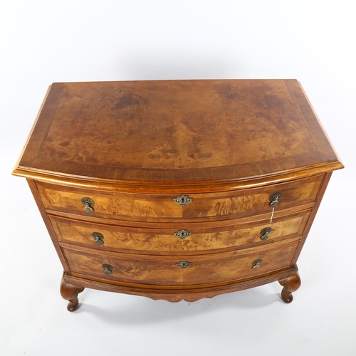 1071 - A burr-walnut bow-front chest of 3 long drawers, early 20th century on cabriole legs, width 90cm, de... 