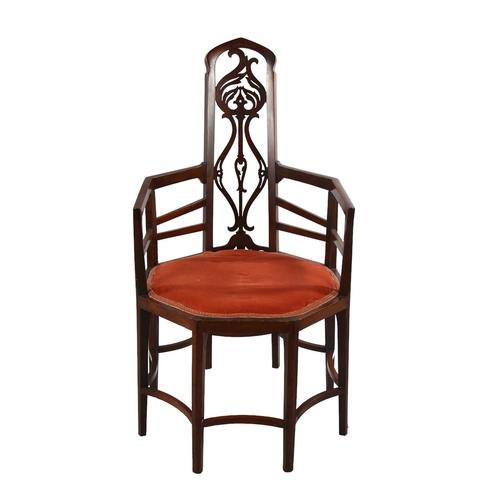 1076 - An unusual Arts and Crafts/Art Nouveau 8-legged mahogany-framed armchair in the manner of Liberty & ... 