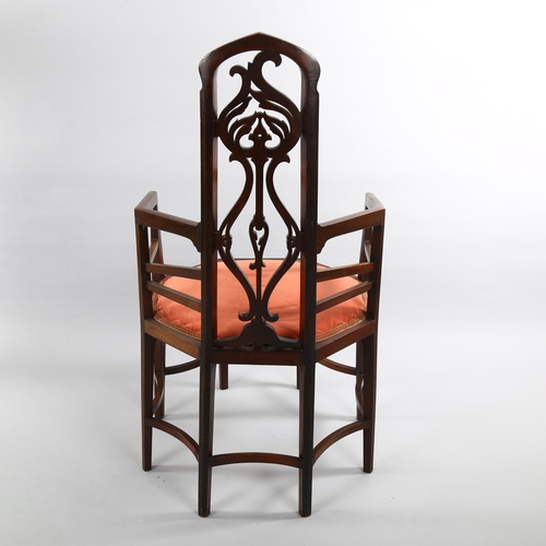 1076 - An unusual Arts and Crafts/Art Nouveau 8-legged mahogany-framed armchair in the manner of Liberty & ... 