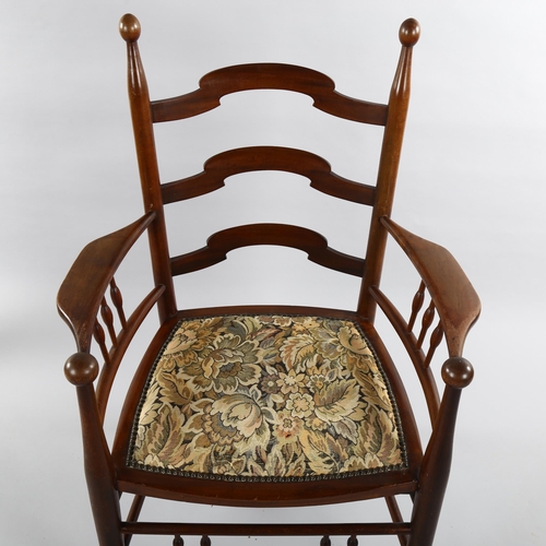 1078 - Attributed to William Birch for Liberty & Co, highly stylised ladder-back armchair with spindled dec... 