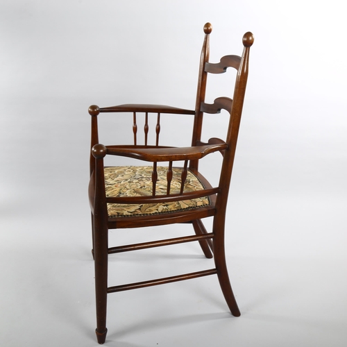 1078 - Attributed to William Birch for Liberty & Co, highly stylised ladder-back armchair with spindled dec... 