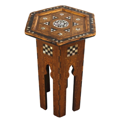 1080 - A small Anglo-Moorish hexagonal occasional table in the manner of Liberty & Co, with inlaid mother-o... 