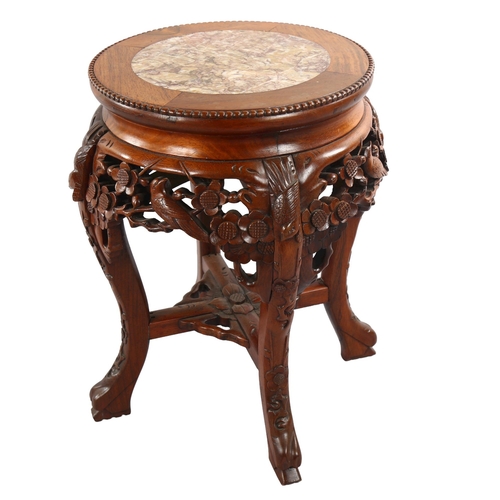 1082 - A Chinese rosewood circular occasional table, with inset marble top and carved frieze, diameter 31cm... 