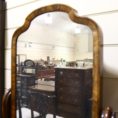 1129 - A 19th century mahogany cheval mirror, with carved and scrolled supports, overall height 160cm