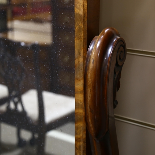 1129 - A 19th century mahogany cheval mirror, with carved and scrolled supports, overall height 160cm