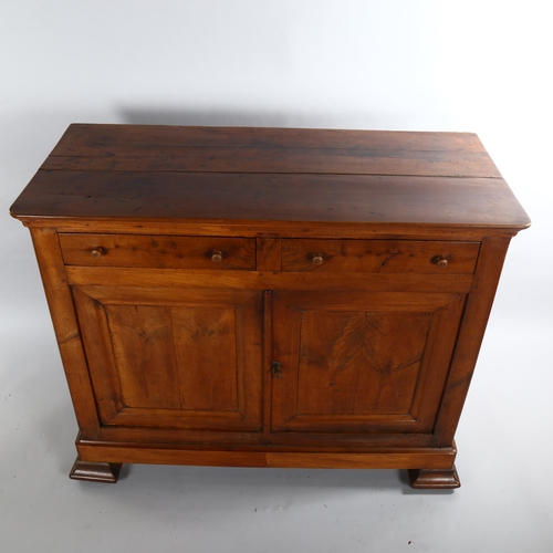 1083 - An 18th century fruitwood buffet, with 2 frieze drawers and panelled cupboards under, width 117cm, d... 