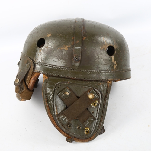 1221 - A post World War II French armoured troop helmet, named to 