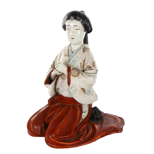 1137 - Japanese porcelain figure of a kneeling girl, height 25cm