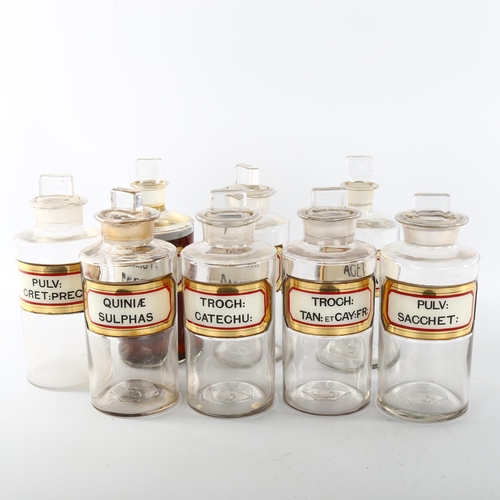 1153 - A set of Victorian glass chemist's jars with gilded labels, height 19cm (8)