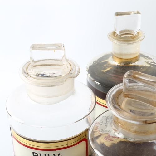 1153 - A set of Victorian glass chemist's jars with gilded labels, height 19cm (8)