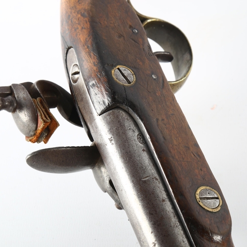 1160 - An early 19th century brass-mounted flintlock pistol, overall length 40cm