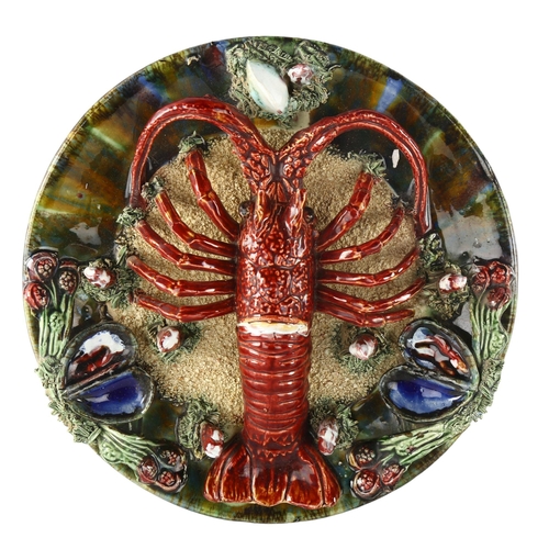 1167 - A Palissy style lobster and crustacean decorated pottery plate, indistinct impressed marks, diameter... 