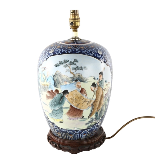 1180 - A Chinese porcelain lamp base on carved wood stand, height excluding fitting 32cm