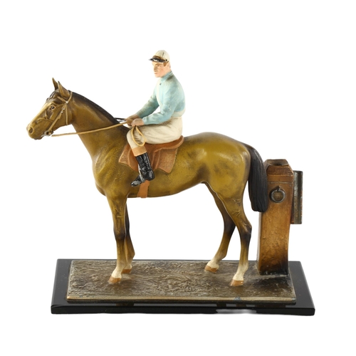 1181 - A cold painted metal racehorse and jockey design table lighter, base length 17.5cm