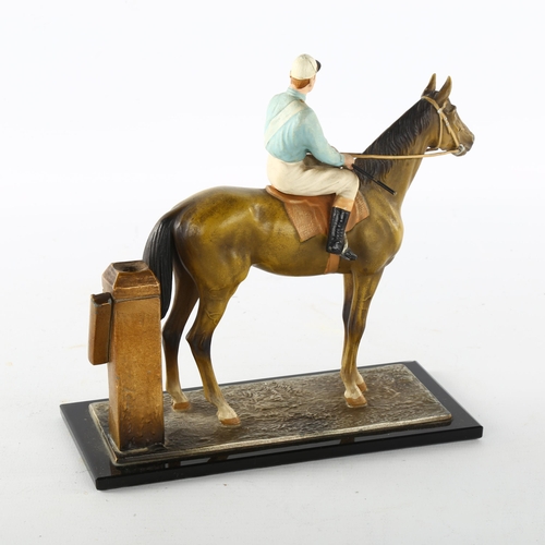 1181 - A cold painted metal racehorse and jockey design table lighter, base length 17.5cm