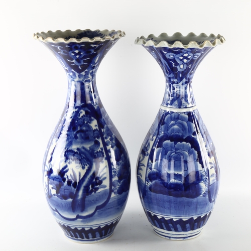 1182 - A pair of Chinese blue and white porcelain vases with frilled rims, height 44cm