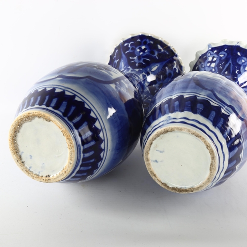 1182 - A pair of Chinese blue and white porcelain vases with frilled rims, height 44cm