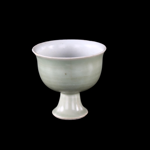 1185 - A Chinese celadon glaze stemmed cup, Qing Dynasty, height 7cm