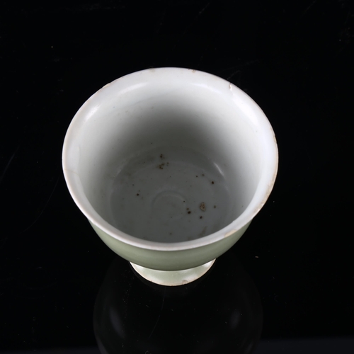 1185 - A Chinese celadon glaze stemmed cup, Qing Dynasty, height 7cm