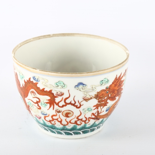 1187 - A Chinese porcelain bowl, with iron red painted dragons and pearls, 6 character mark, diameter 10cm,... 