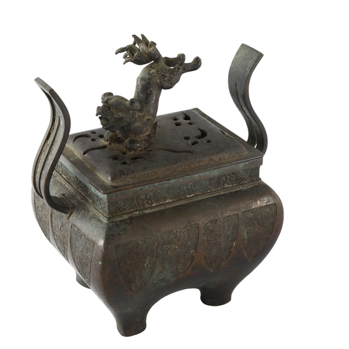 1189 - A Chinese patinated bronze incense burner, with dog of fo finial and 6 character mark, height 17cm