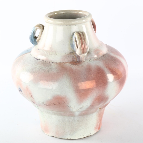 1197 - A Chinese red mottle glaze pot with neck rings, height 24cm