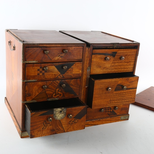 1205 - A Japanese inlaid wood travelling cabinet with parquetry decoration, width 33cm, height 24cm