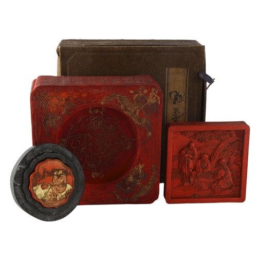 1207 - A large Chinese red and gilt ink stone with moulded figure, width 17cm, boxed, and 2 other ink stone... 