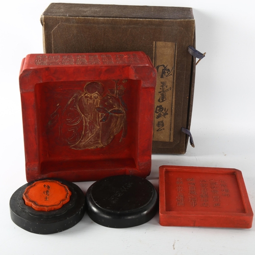 1207 - A large Chinese red and gilt ink stone with moulded figure, width 17cm, boxed, and 2 other ink stone... 