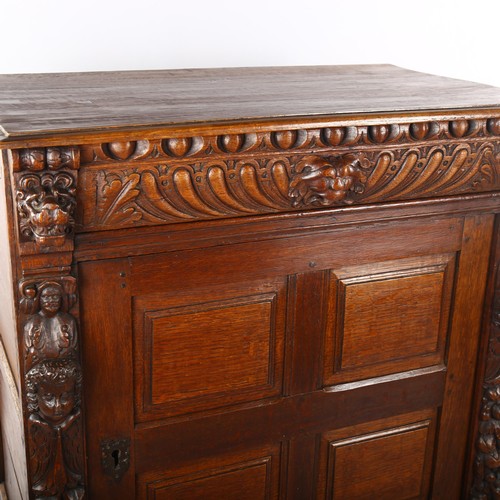 1122 - A 19th century carved oak side cabinet with drawer over cupboard, Height 107cm x Width 92cm x Depth ... 