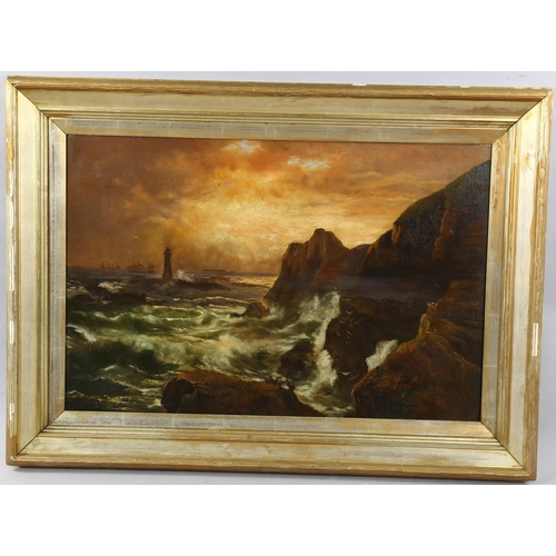 1582 - A late 19th century oil on canvas, sunset coastal scene near a lighthouse, unsigned, 50cm x 75cm, fr... 