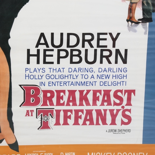 1606 - Poster on paper, Audrey Hepburn in Breakfast at Tiffany’s, framed, 99cm x 69cm