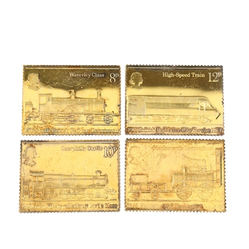 540 - A set of 4 Elizabeth II silver-gilt 150th Railway Anniversary (1825 - 1975), replica stamp set, incl... 