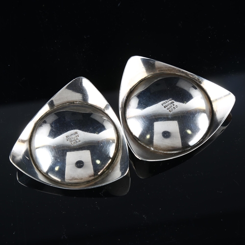 545 - BENT KNUDSEN - a pair of Danish modernist sterling silver taper stick holders, model no. 1050, width... 