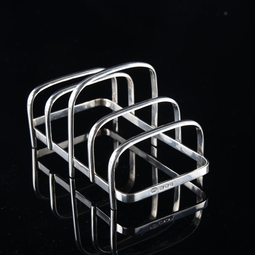 546 - An Arts and Crafts Elizabeth II silver 5-bar toast rack, by Central School of Arts and Crafts, hallm... 