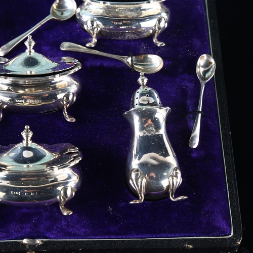 559 - A George V silver 6-piece cruet set, with blue glass liners, by Walker & Hall, hallmarks Birmingham ... 