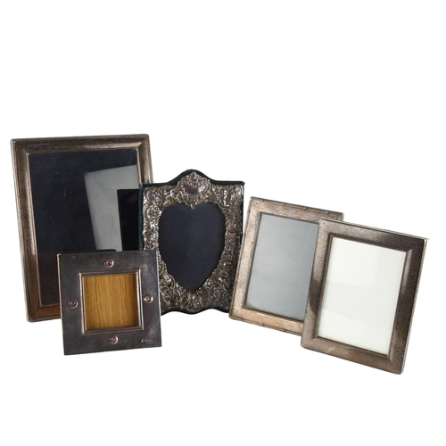 563 - 5 silver-fronted photo frames, largest overall 24cm x 19cm (5)