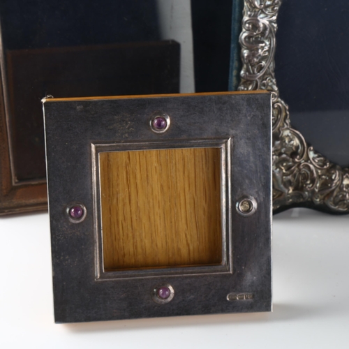 563 - 5 silver-fronted photo frames, largest overall 24cm x 19cm (5)