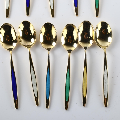 567 - MEKA - a set of 11 Danish vermeil sterling silver and harlequin enamel coffee spoons, length 9cm